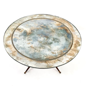 1950's Italian side table with Verre Eglomise top .