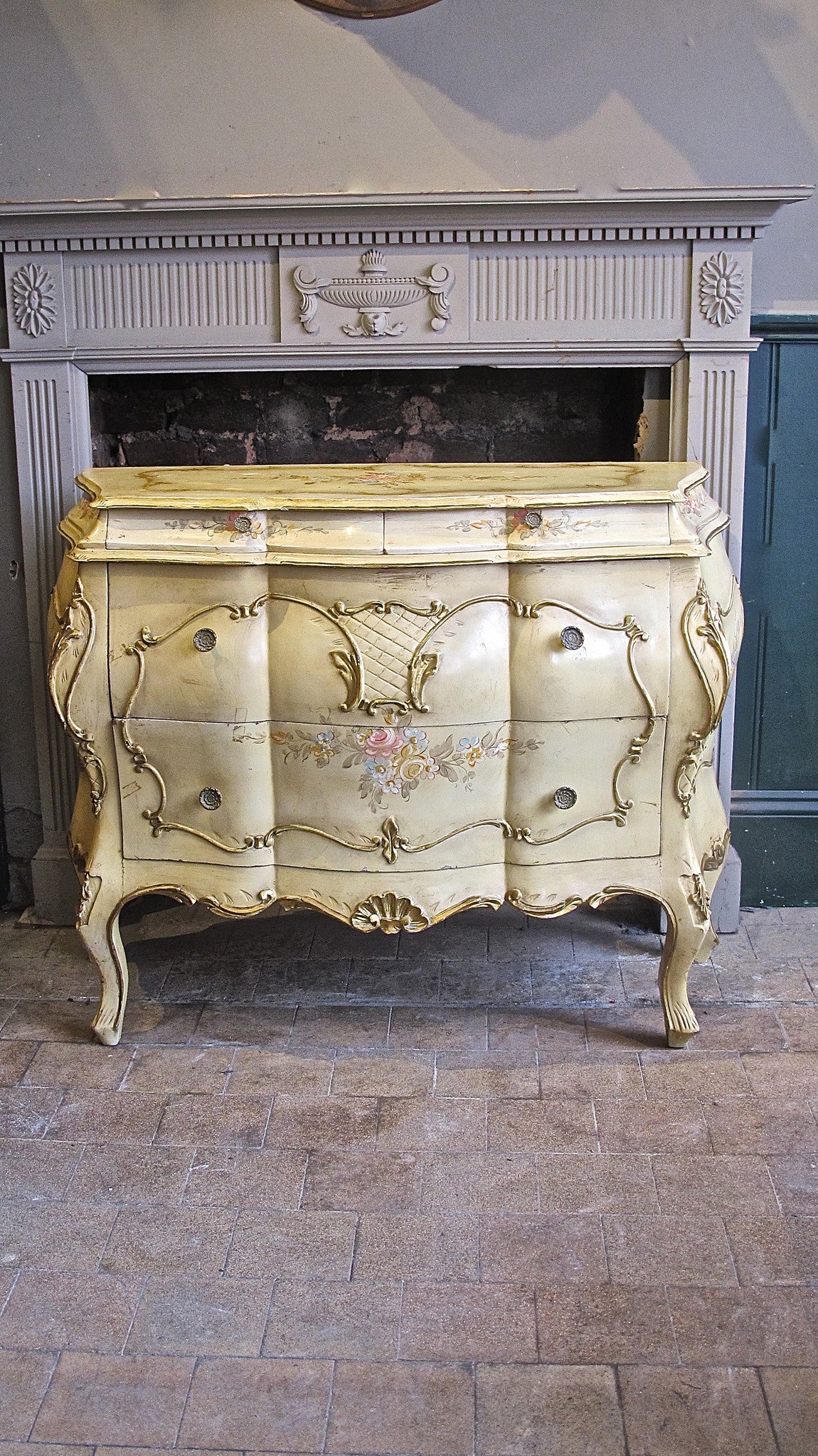 Bombe fronted italian commode circa 1950 with hand painted decoration.