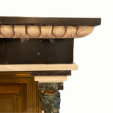 Striking French mid century fireplace flanked by two greyhounds.