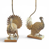 Pair of large gilt metal lamps modelled as turkeys.