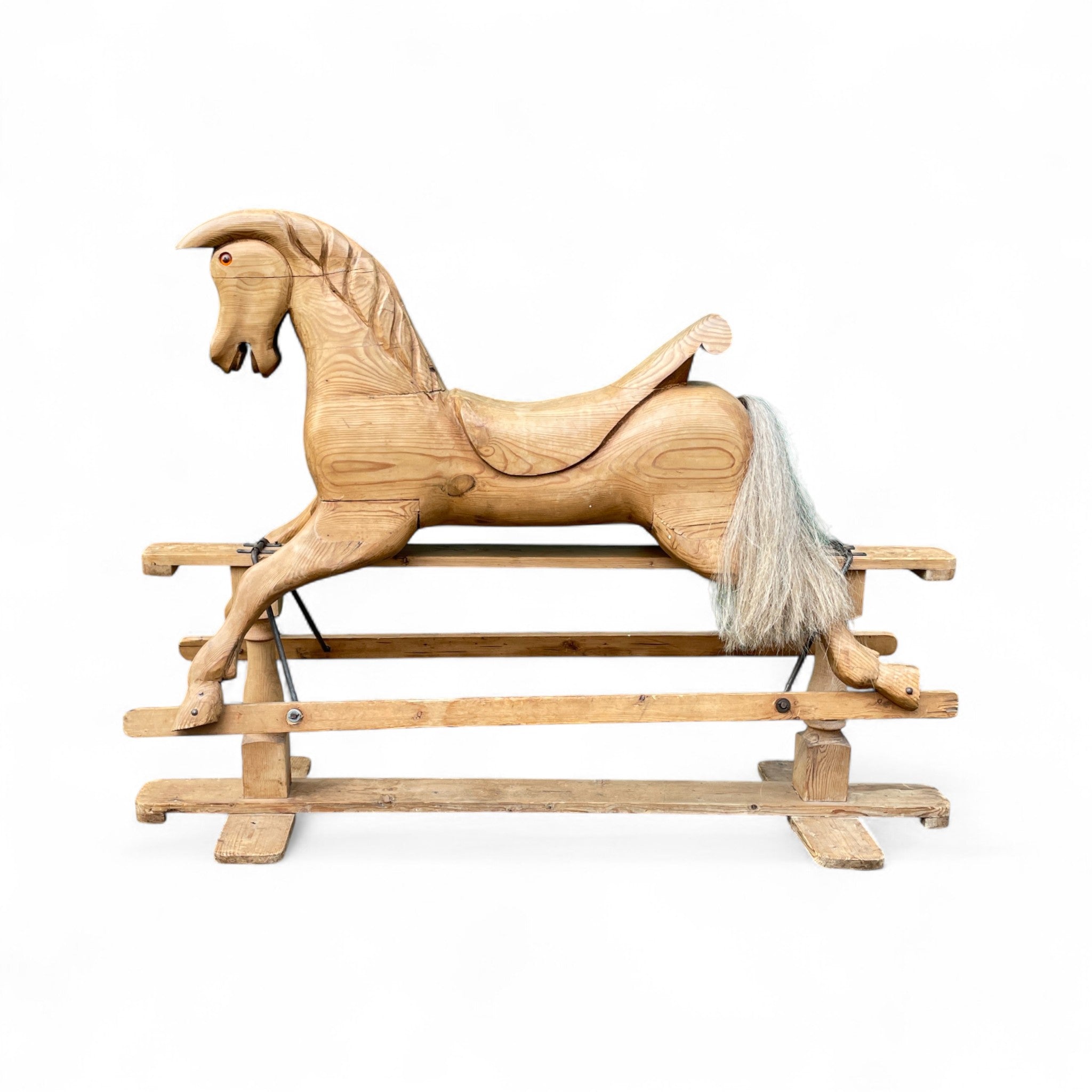 Large early twentieth century carved wood rocking horse .