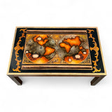 1970's coffee table with reverse glass map of the antique world .