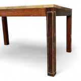 1970's coffee table with reverse glass map of the antique world .