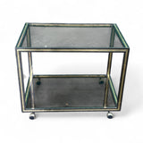 1970's Italian drinks trolley with brass and chrome detailing.
