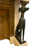 Striking French mid century fireplace flanked by two greyhounds.