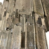 Large and unusual 1970's Murano chandelier with tiered glass and metal drops.