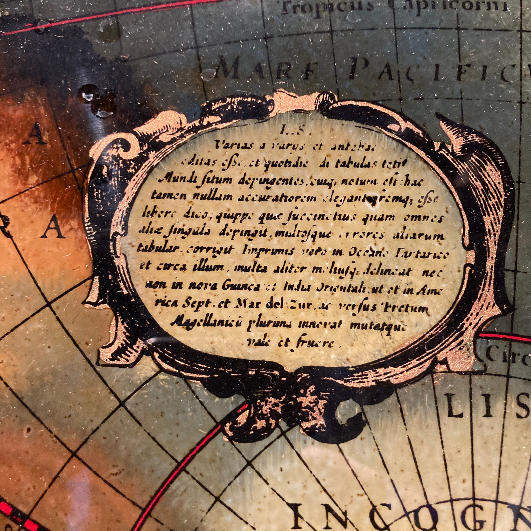 1970's reverse painted on glass antique world map in maple frame.
