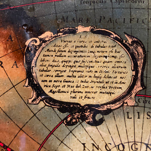 1970's reverse painted on glass antique world map in maple frame.