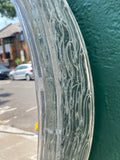 Circular 1970's back lit resin mirror.