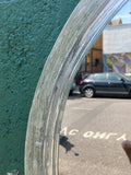 Circular 1970's back lit resin mirror.