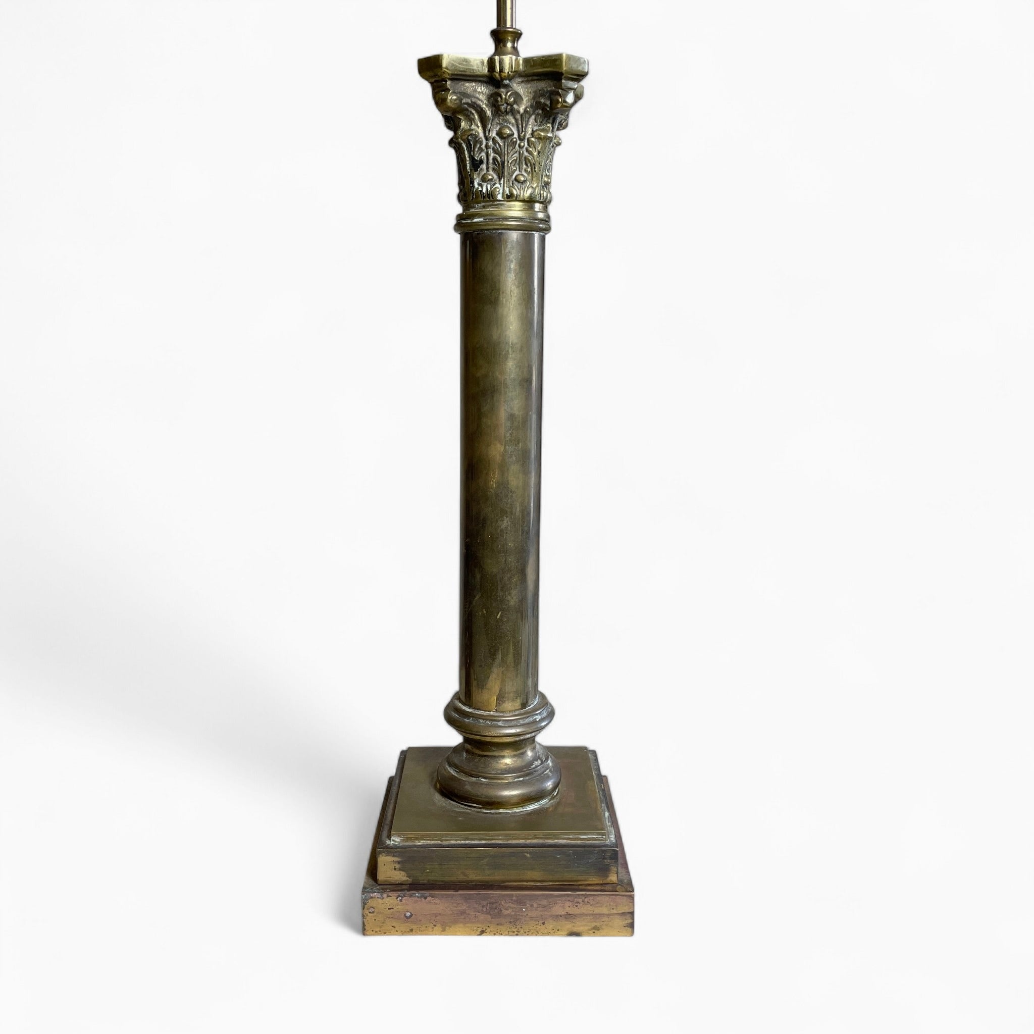 Classical pair of brass table lamps with tapered white glass shades.