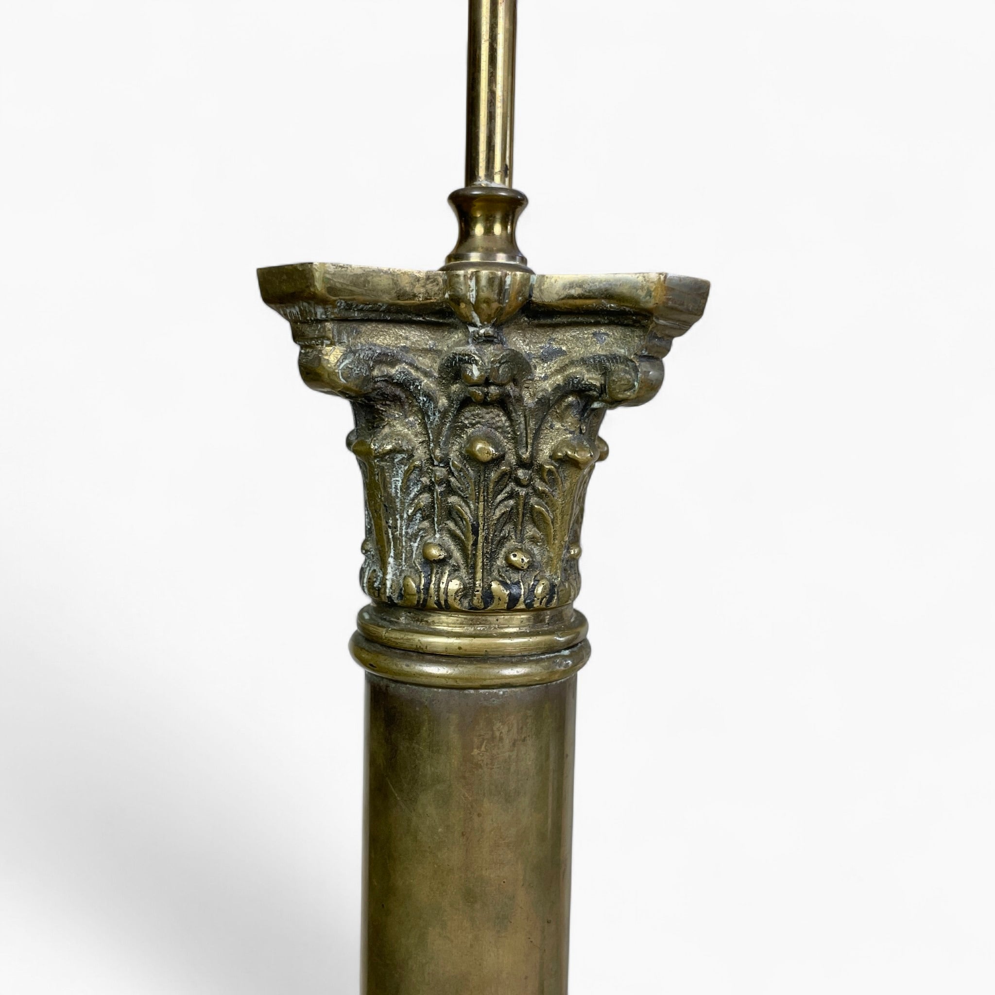 Classical pair of brass table lamps with tapered white glass shades.