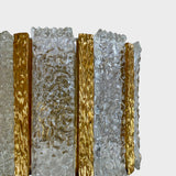 Decorative pair of 1970's gilt metal and glass wall lights .