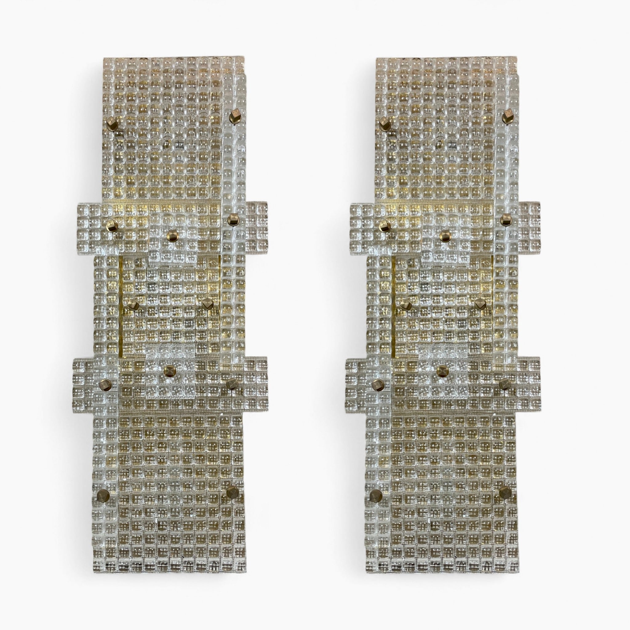 Large Murano glass and brass wall lamps in the brutalist style.