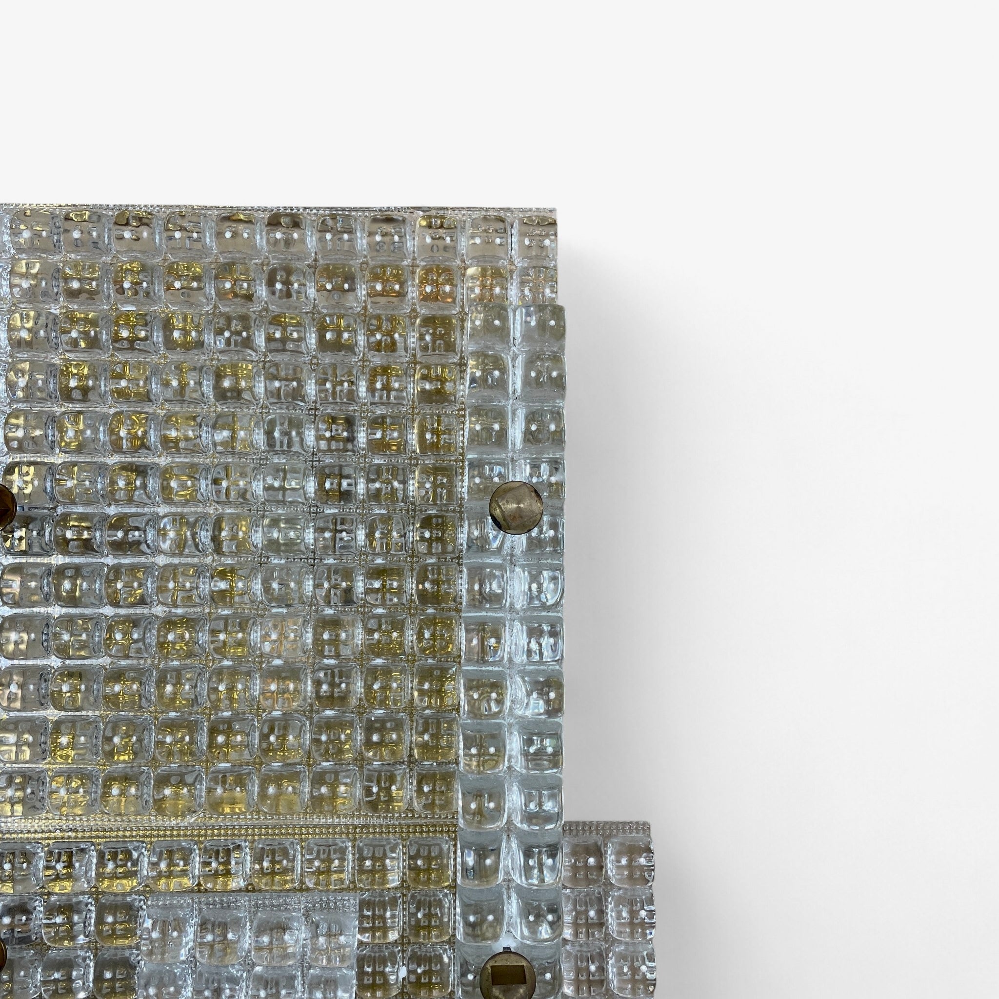 Large Murano glass and brass wall lamps in the brutalist style.