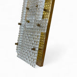 Large Murano glass and brass wall lamps in the brutalist style.