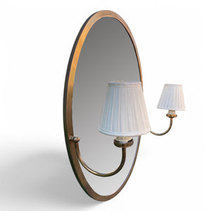 1970's Brass oval mirror with wall light attachment.