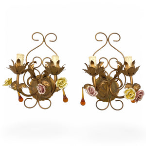 pair of gilt metal wall lights with enamelled roses and amber drops.