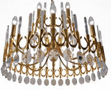 Large 1970's Gilt metal chandelier by Gaetano Sciolari .