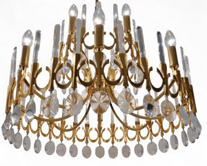 Large 1970's Gilt metal chandelier by Gaetano Sciolari .