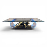 Vintage 1970's coffee table with two tone bronze panther and perspex sides.