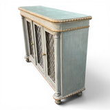 Decorative antique sideboard with mirrored doors and parcel gilt finnish.