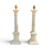 Pair of early twentieth century carved alabaster lamps .
