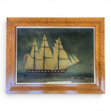 Reverse glass maritime image of the U.S.S Constitution in maple frame.