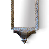 Pair of decorative silver gilt and carved wood wall light with mirror panel.