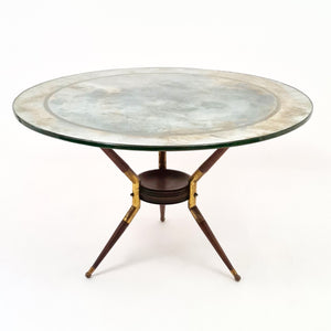 1950's Italian side table with Verre Eglomise top .