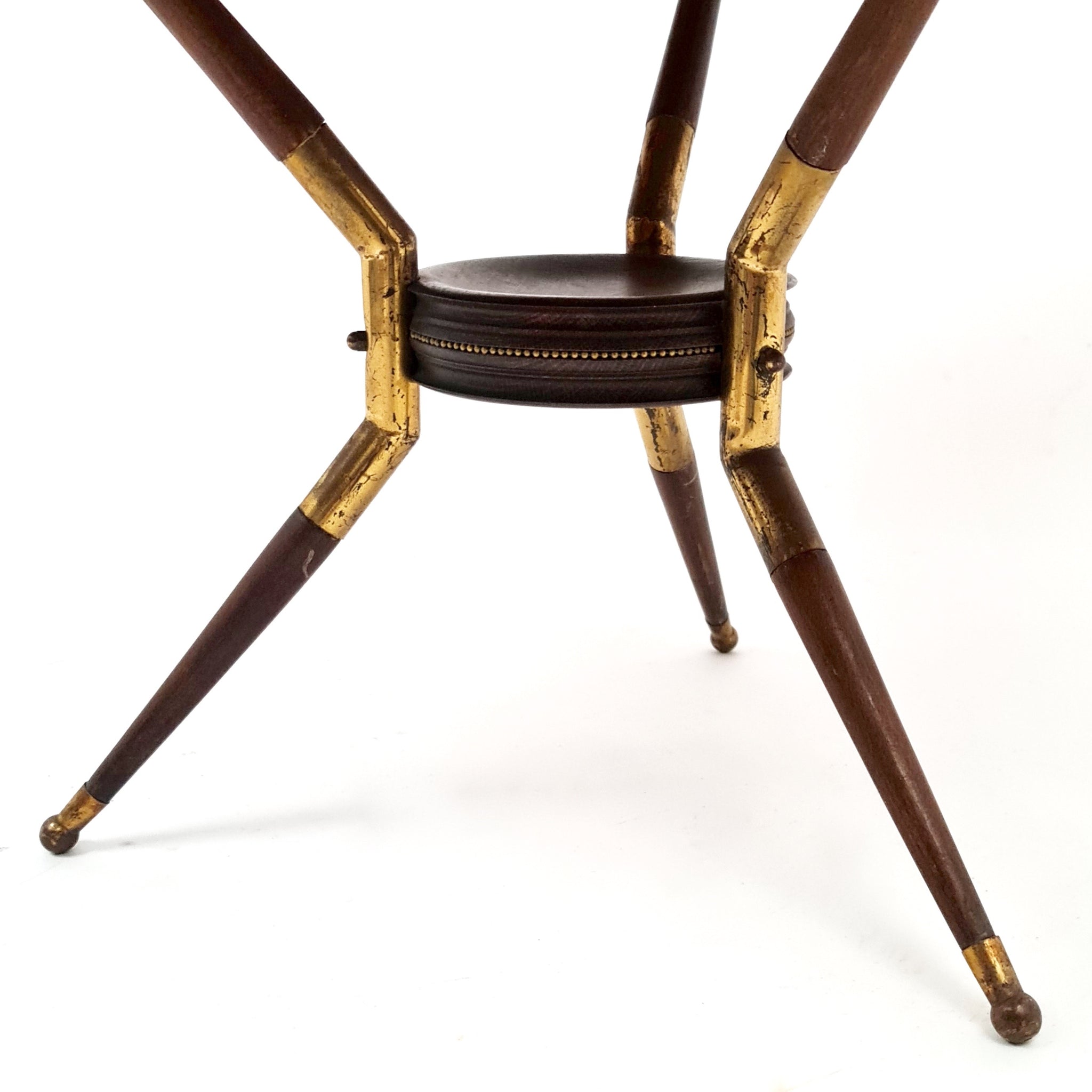 1950's Italian side table with Verre Eglomise top .