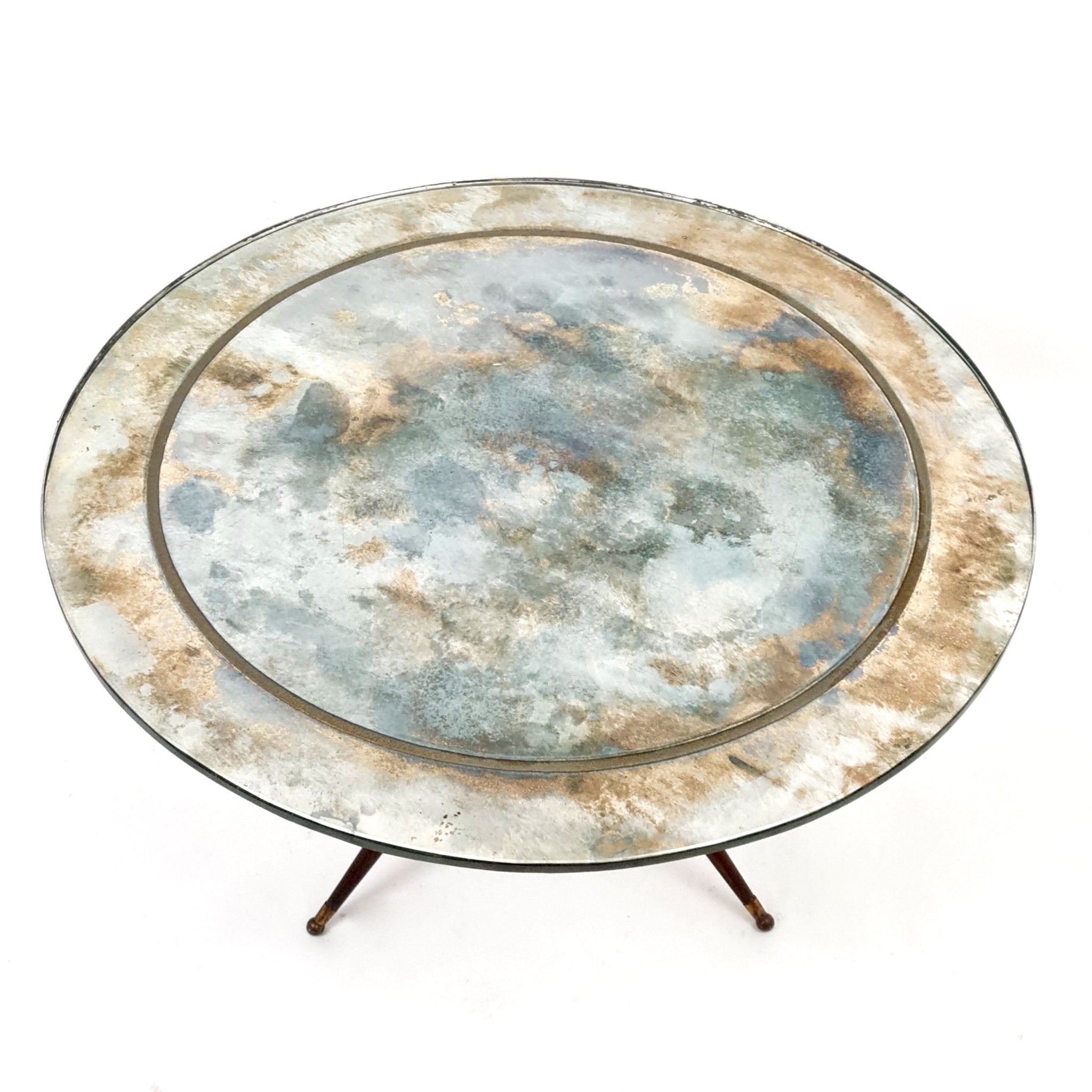1950's Italian side table with Verre Eglomise top .