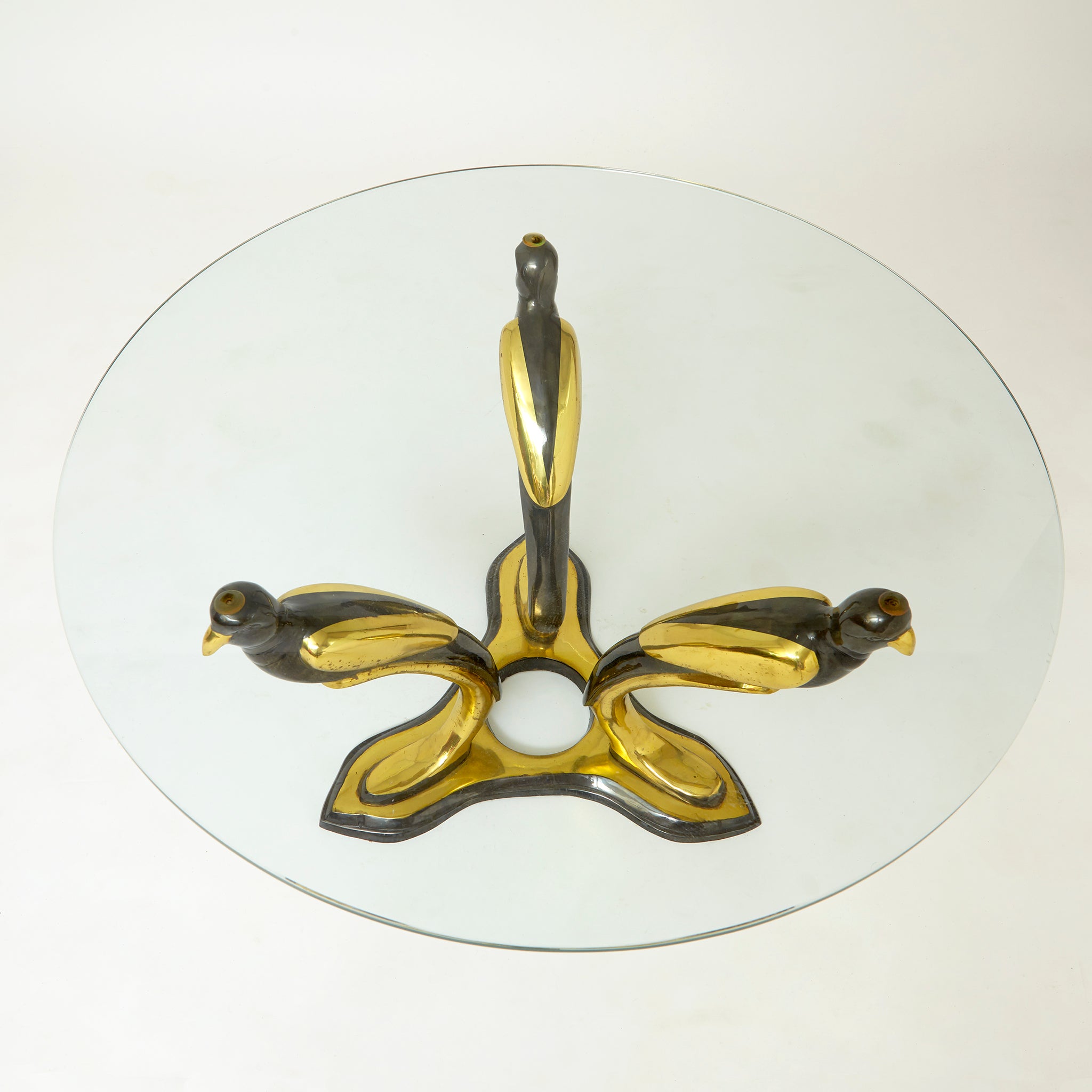 Patinated bronze 'bird'  coffee table in the style of Willy Daro.