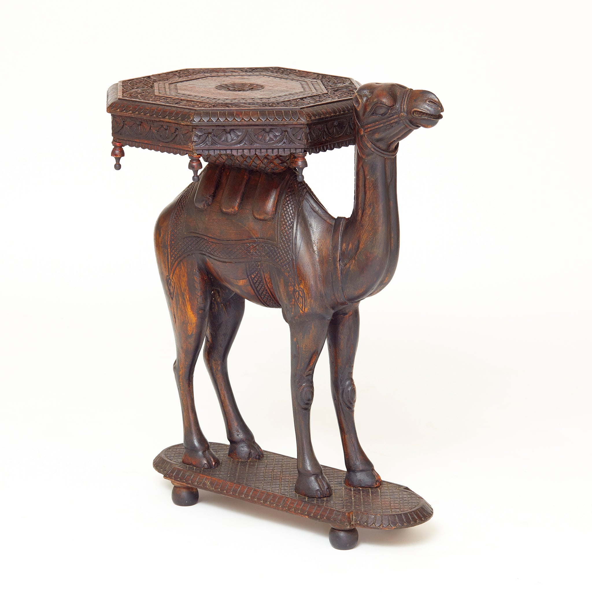Early twentieth century oriental Carved wood Camel Side Table .