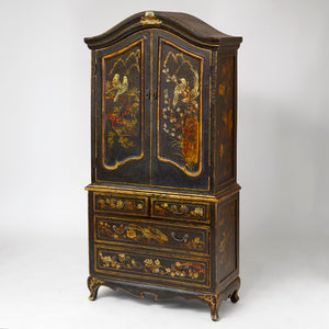 Charming dwarf cabinet with naturalistic decorations and gilt details.