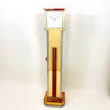 A mirrored Art Deco cocktail cabinet modelled as a long case clock .