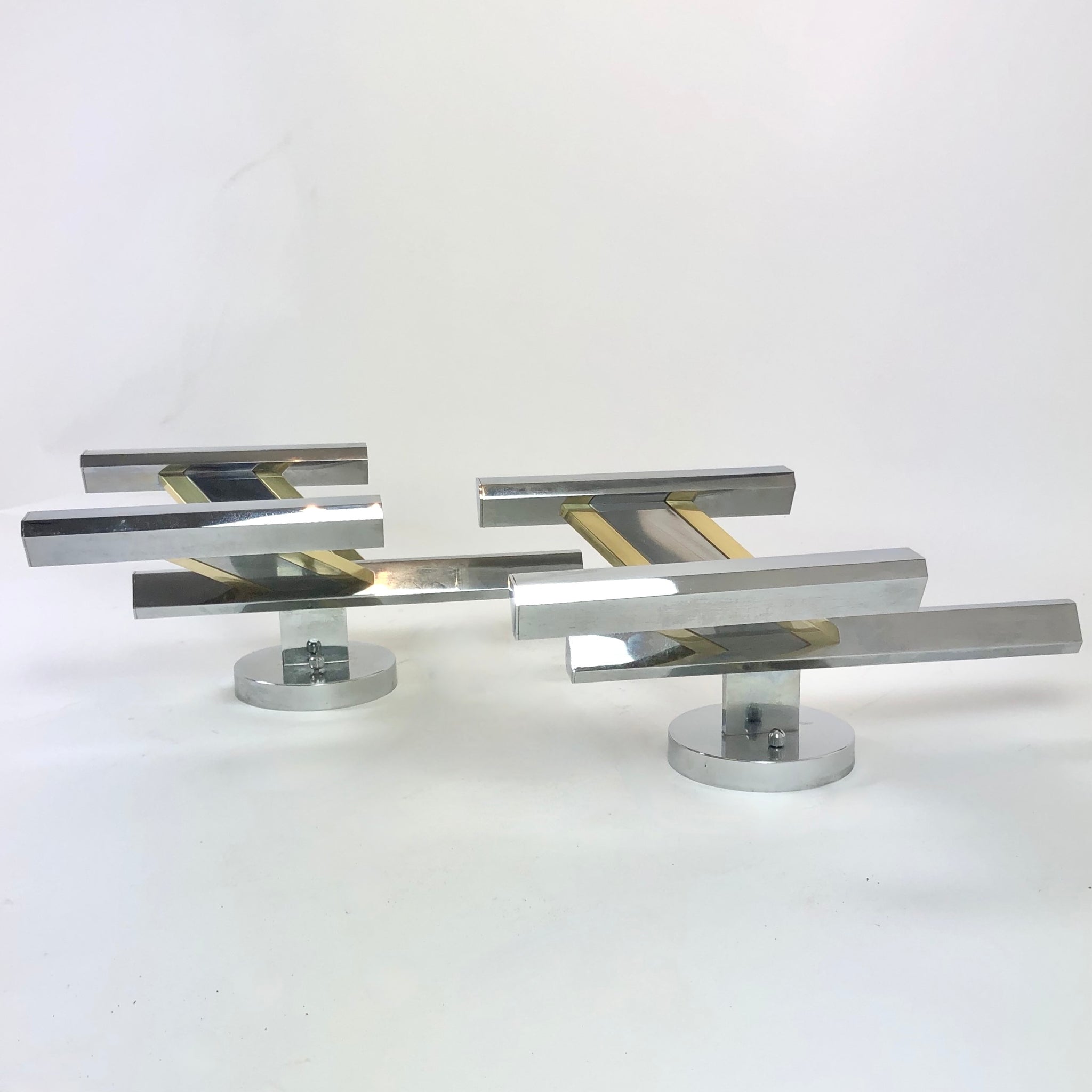 Fabulous pair of Scolari Modernist wall lights.