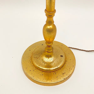Gilt metal floor lamp in the style of Maison Charles.