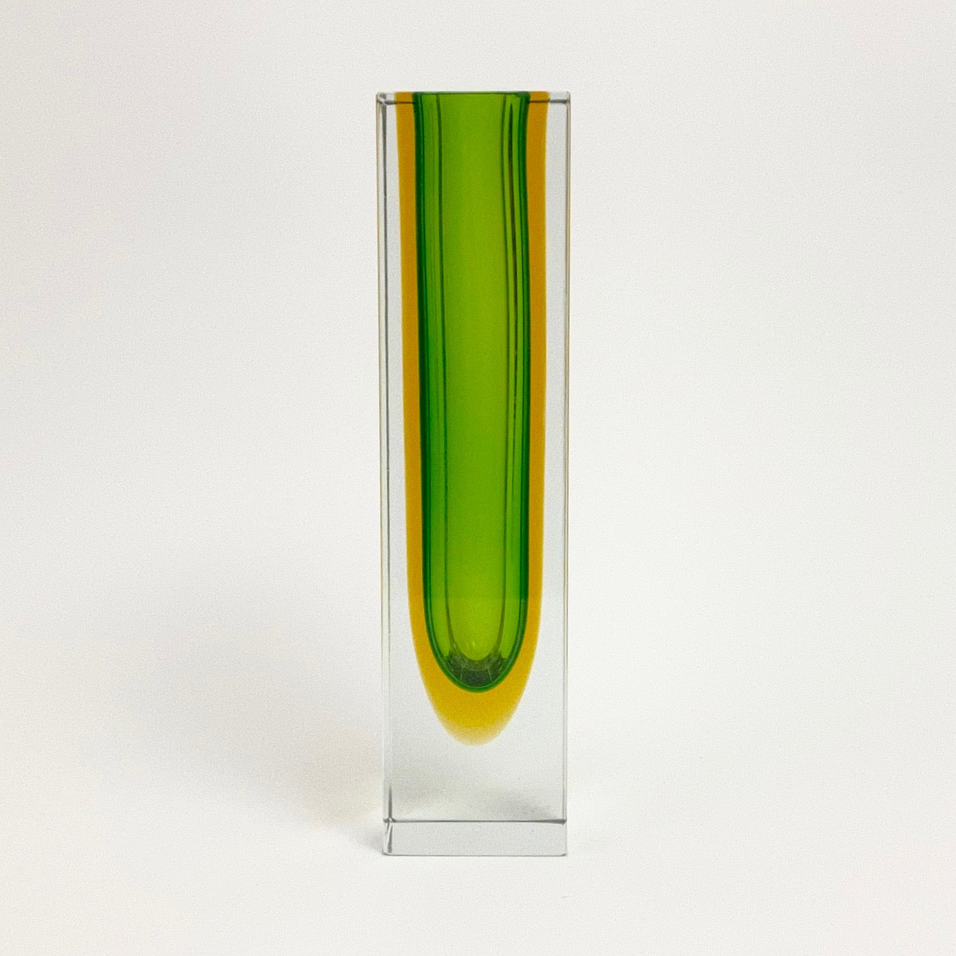 Medium Murano Seguso  vase with green and ochre cased body .