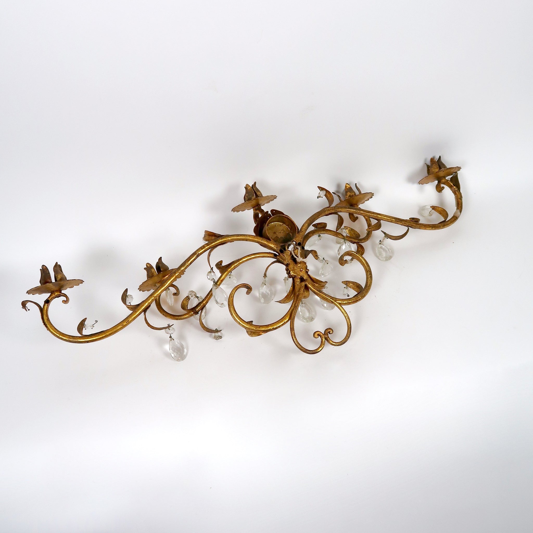 Unusual gilt metal Italian wall light with glass drops circa 1950 .