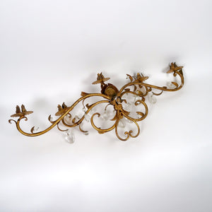 Unusual gilt metal Italian wall light with glass drops circa 1950 .