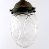 Decorative english bronze hanging light with cut glass shade .