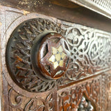 Highly decorative early 20th century corner cabinet.