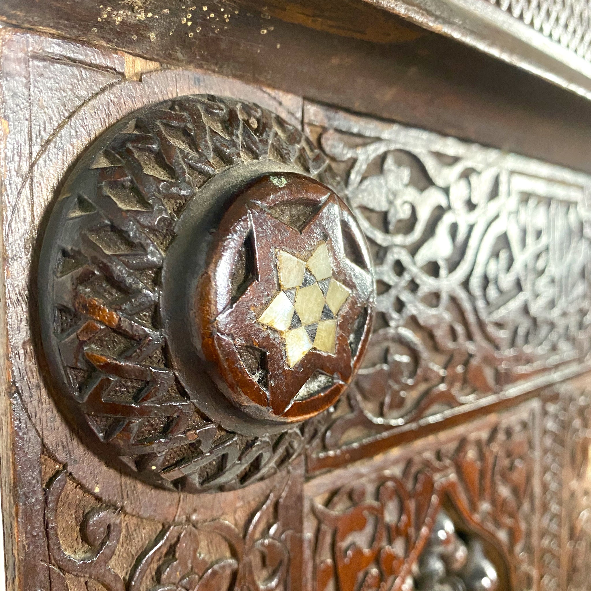 Highly decorative early 20th century corner cabinet.