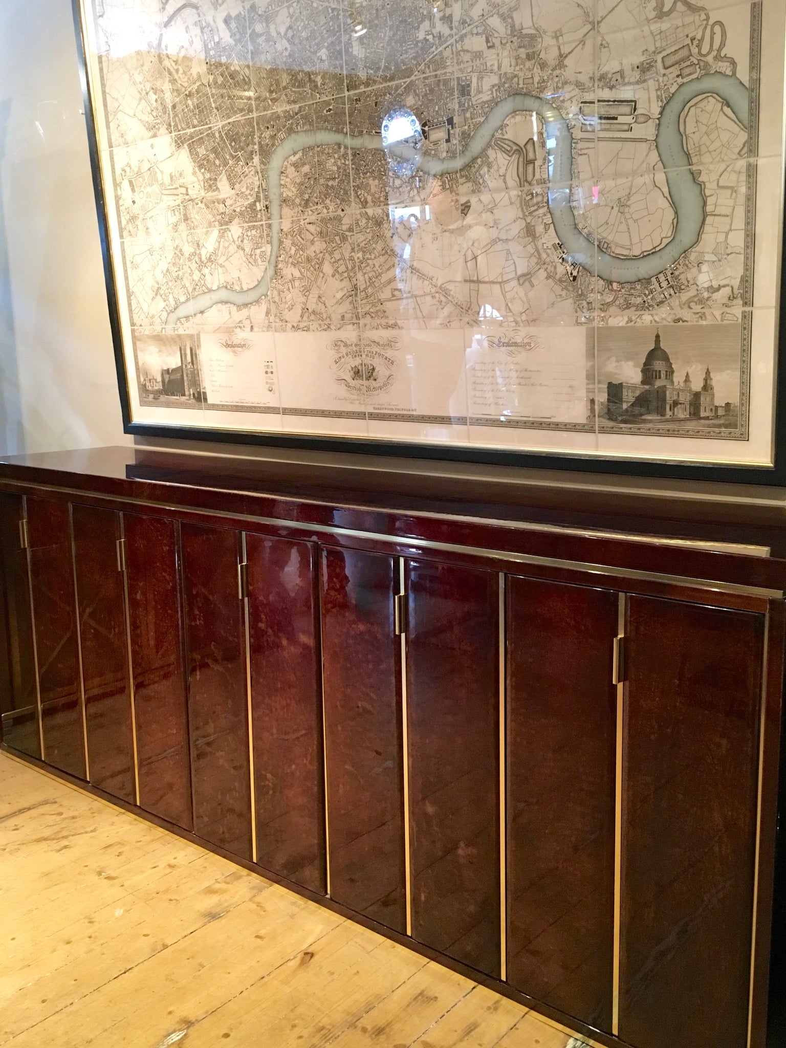 Highly decorative lacquered goatskin sideboard with polished brass details . Italian circa 1970.