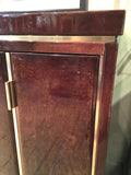 Highly decorative lacquered goatskin sideboard with polished brass details . Italian circa 1970.
