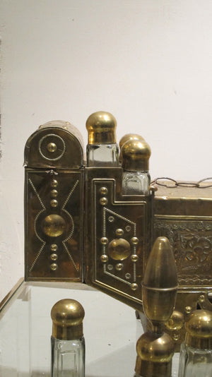 X A highly decorative brass Turkish street shoe shine set with original bottles.