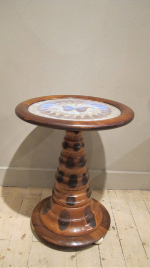 X Mid 20th-century Brazilian monkey puzzle wood table with circular top inset with butterflies