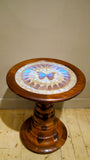 X Mid 20th-century Brazilian monkey puzzle wood table with circular top inset with butterflies
