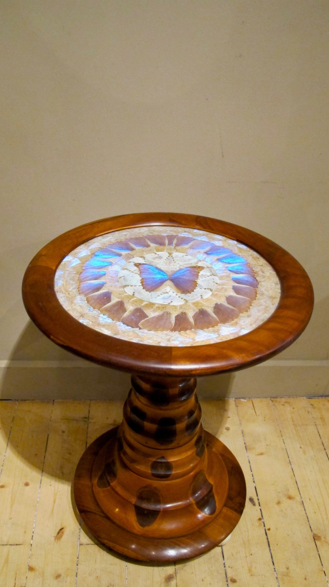 X Mid 20th-century Brazilian monkey puzzle wood table with circular top inset with butterflies